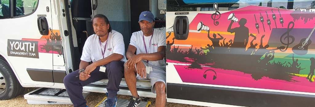Youth engagement team members sat in the youth bus