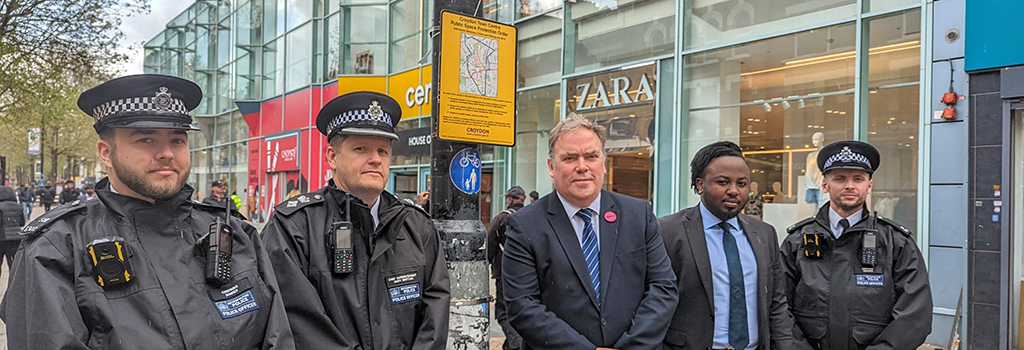 The Mayor joned by Councillor Kolade, and the Borough Commander of the Metropolitan Police and two officers