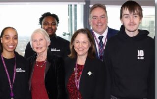 Mayor Perry and Cllr Maria Gatland with staff members and young people
