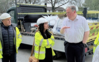 A picture of the Mayor at a New Addington construction site.