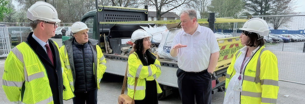 A picture of the Mayor at a New Addington construction site.