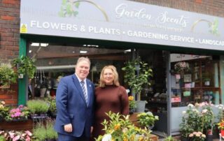 Mayor Perry with a Purley business owner standing outside their florist shop