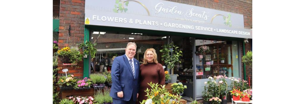 Mayor Perry with a Purley business owner standing outside their florist shop