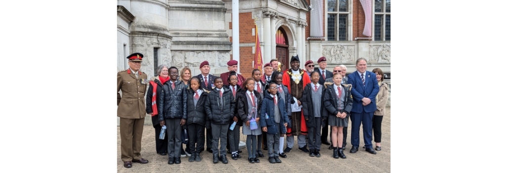 Group photo of schoolchildren with Civic and Executive Mayors at VE Day flag raising ceremony