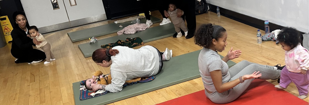 Mums and babies take part in a Let's Move exercise session.
